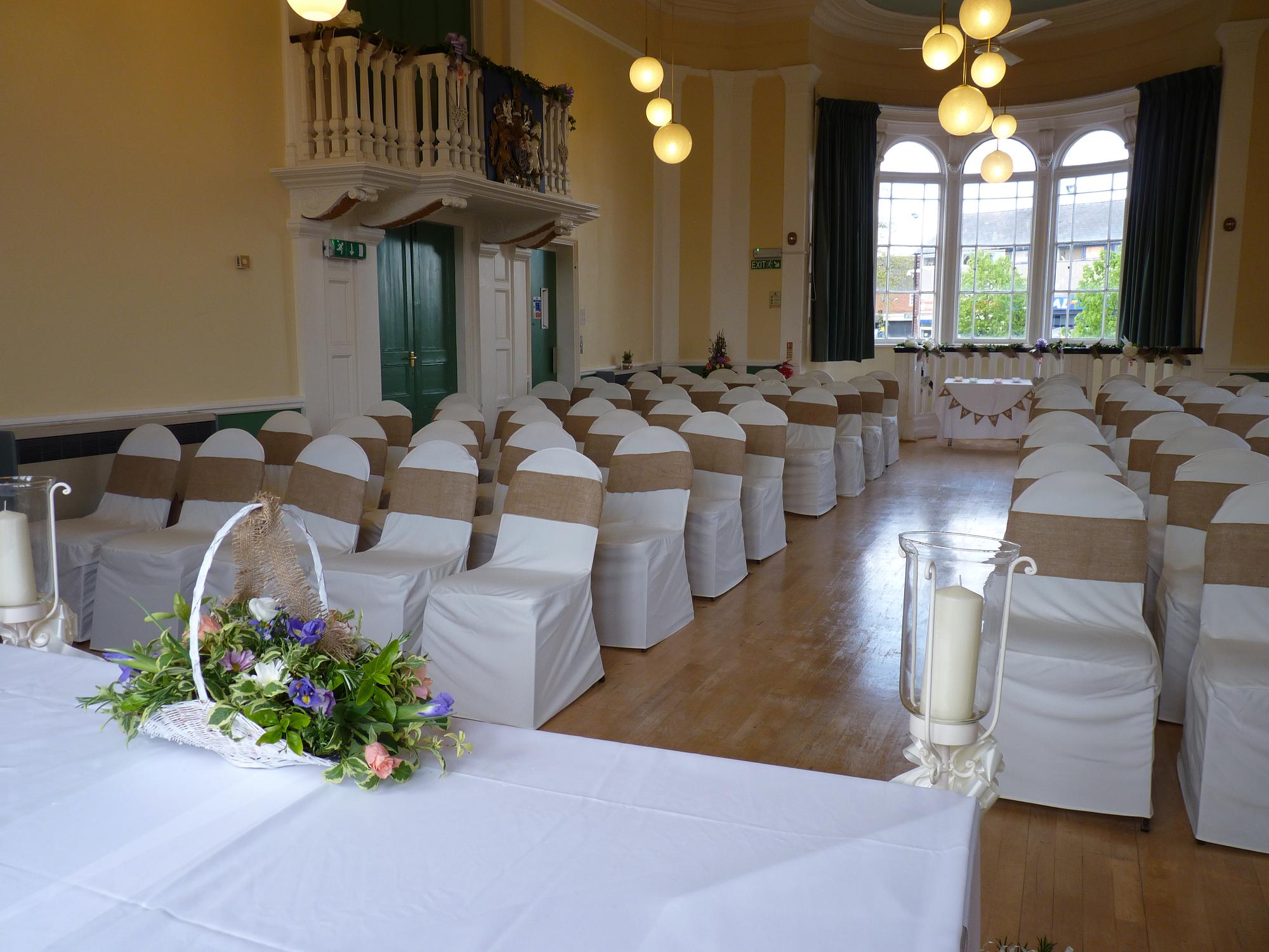 Lutterworth Town Hall wedding service with hessian bows on chairs