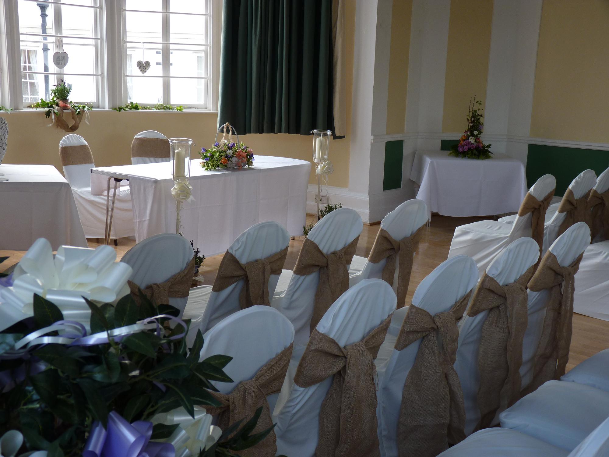 Lutterworth Town Hall wedding service with hessian bows on chairs